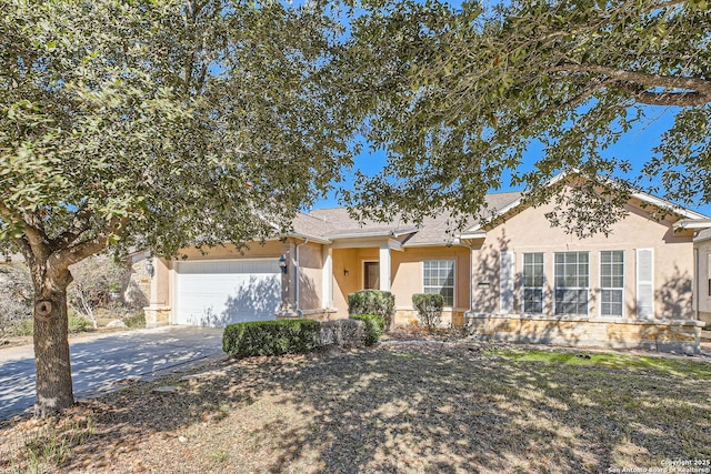 ranch-style house featuring a garage