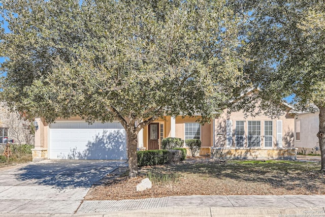 obstructed view of property featuring a garage