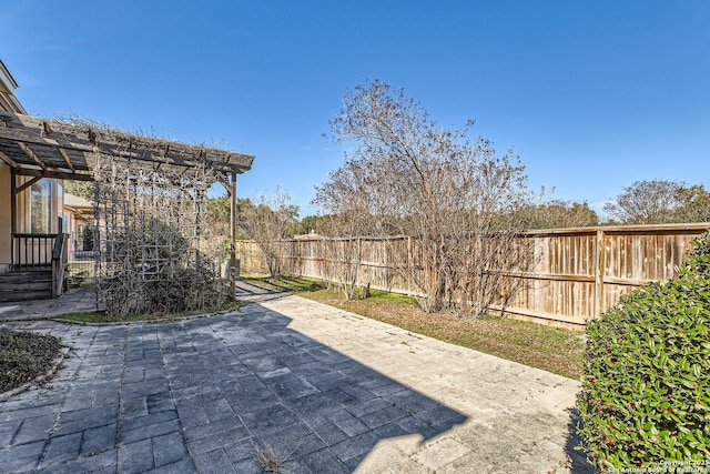 view of patio featuring a pergola