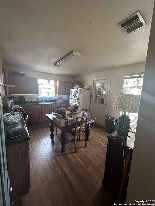 dining room featuring dark wood-type flooring