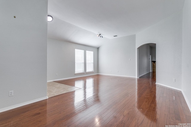 unfurnished room featuring hardwood / wood-style floors