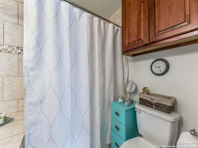 bathroom with a shower with curtain