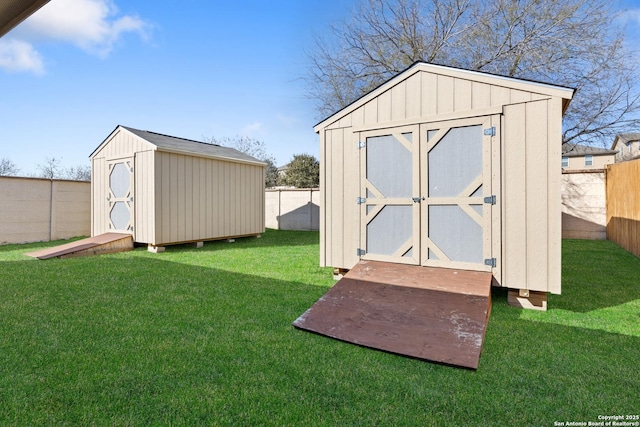 view of outbuilding featuring a yard