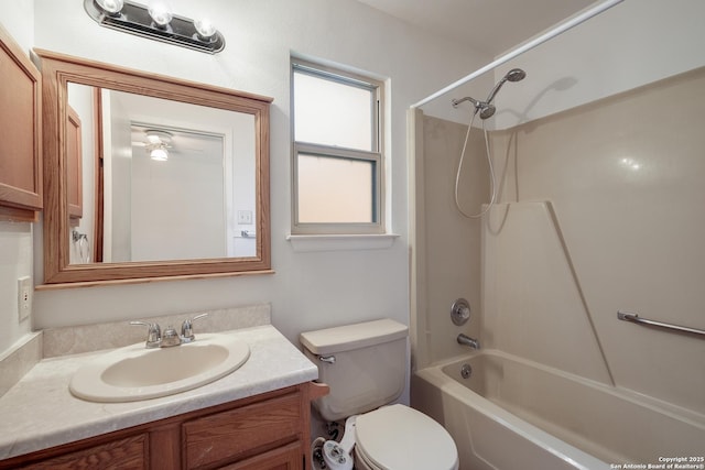 full bathroom with vanity, bathtub / shower combination, and toilet