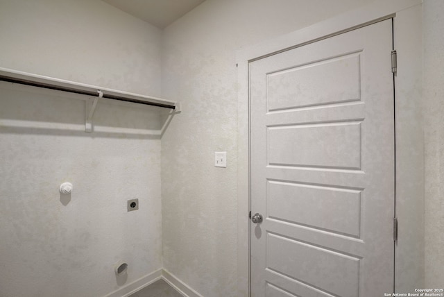 laundry room with tile patterned floors and hookup for an electric dryer