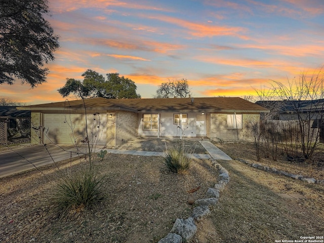 view of front of property featuring a garage