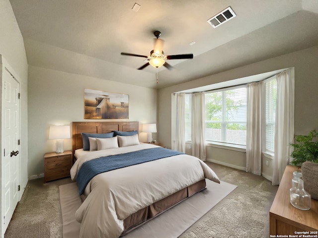 carpeted bedroom featuring ceiling fan and lofted ceiling