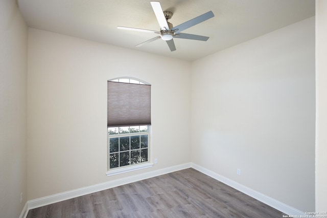 spare room with ceiling fan and light hardwood / wood-style flooring