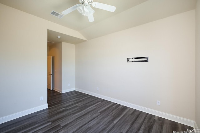 unfurnished room featuring ceiling fan, dark hardwood / wood-style flooring, and vaulted ceiling