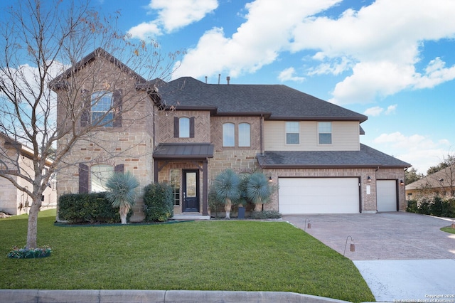 view of front of home featuring a garage and a front yard