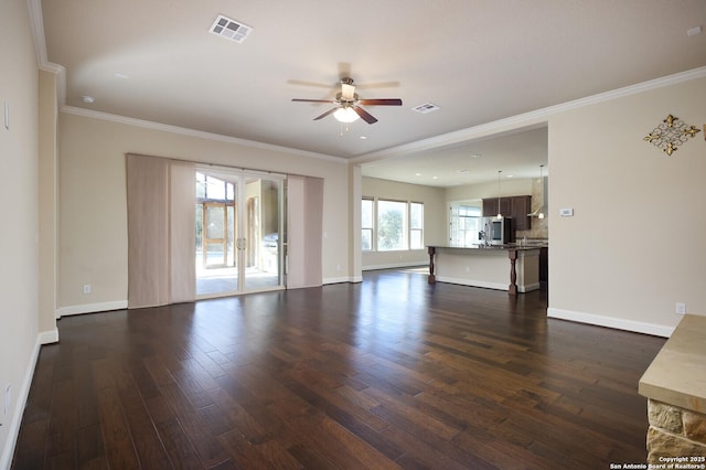 unfurnished living room with crown molding, ceiling fan, and dark hardwood / wood-style flooring