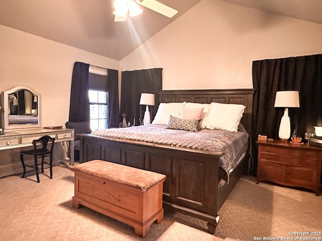 carpeted bedroom featuring lofted ceiling and ceiling fan