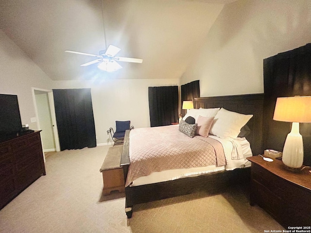 carpeted bedroom featuring ceiling fan and lofted ceiling