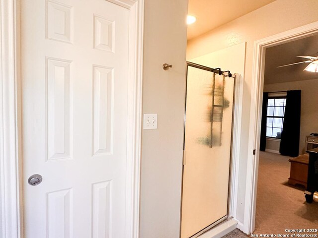 bathroom with ceiling fan