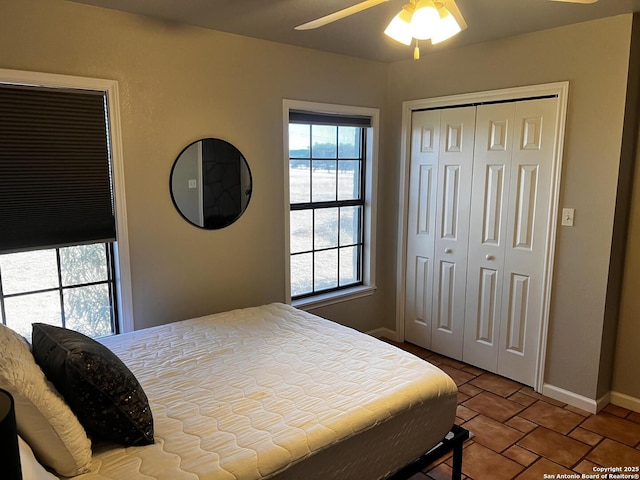 bedroom featuring a closet and ceiling fan