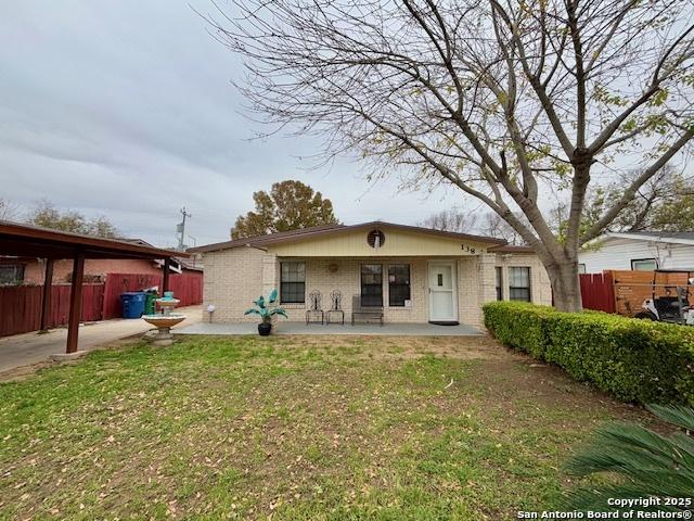 138 Ballard Dr, San Antonio, TX 78226 - view of front of home with a patio area and a front yard