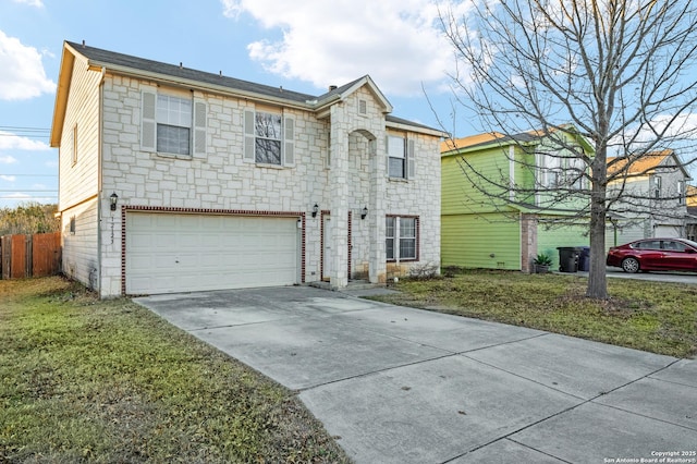 view of front facade featuring a garage and a front yard