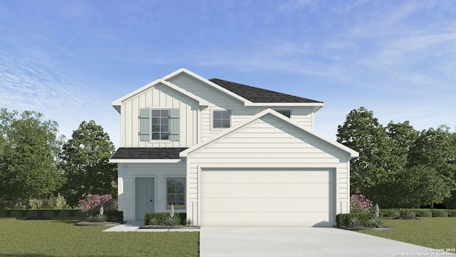 view of front of property with a garage and a front lawn