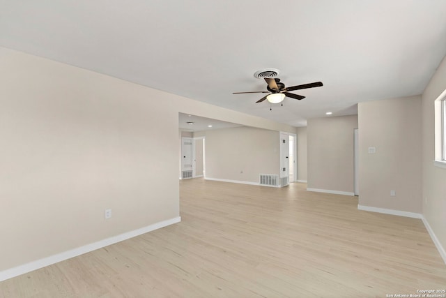 unfurnished room featuring ceiling fan and light hardwood / wood-style flooring