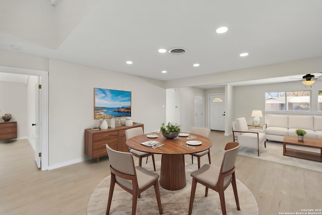 dining area featuring ceiling fan and light hardwood / wood-style floors