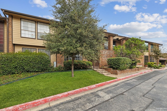 view of front of home with a front yard