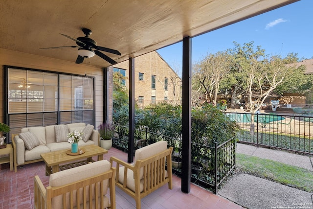 sunroom / solarium with ceiling fan