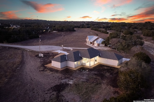 view of aerial view at dusk