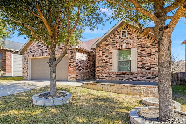 front of property featuring a garage and a front lawn