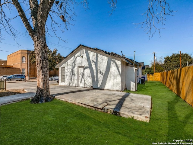 garage with a lawn