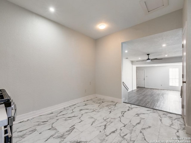 unfurnished room featuring ceiling fan