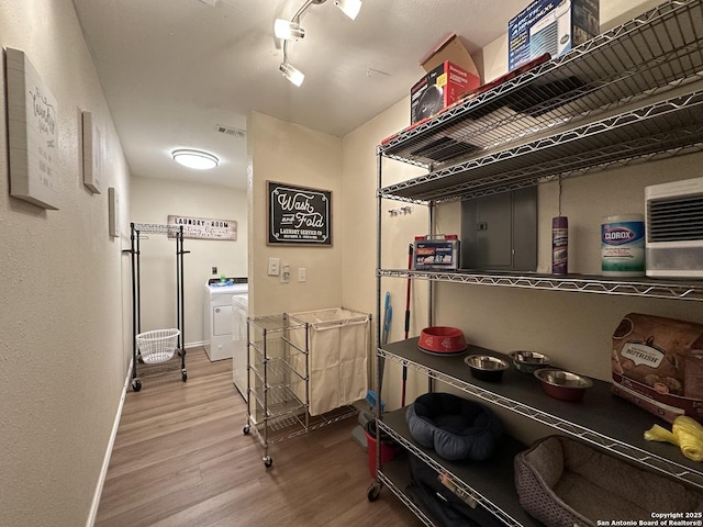 storage area featuring washer / dryer