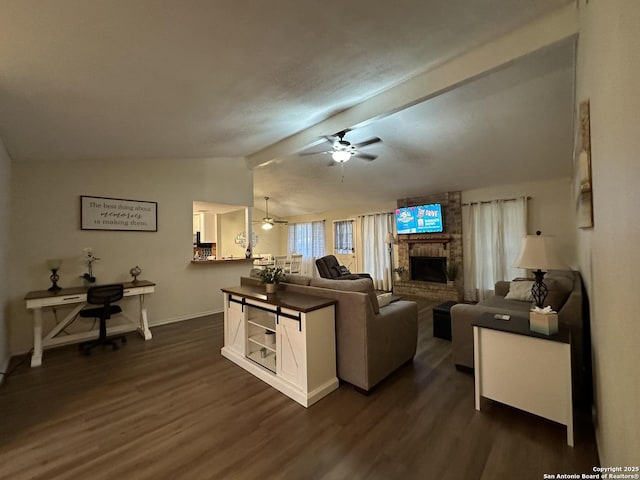 living room featuring ceiling fan, lofted ceiling, a fireplace, and dark hardwood / wood-style flooring