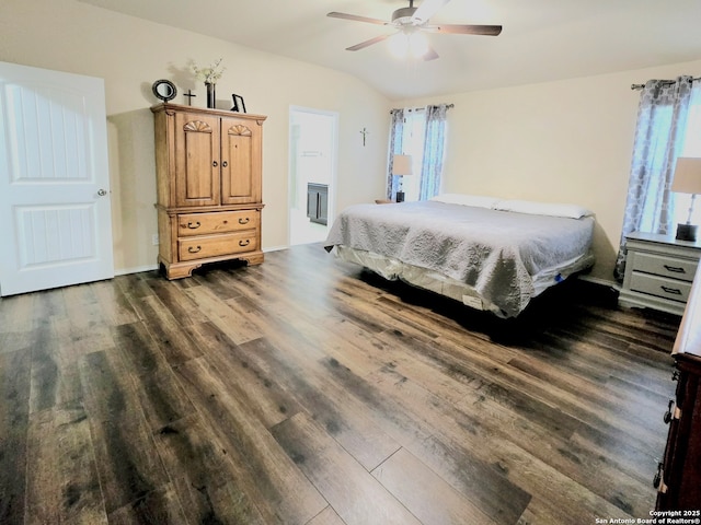 bedroom featuring dark hardwood / wood-style floors and ceiling fan