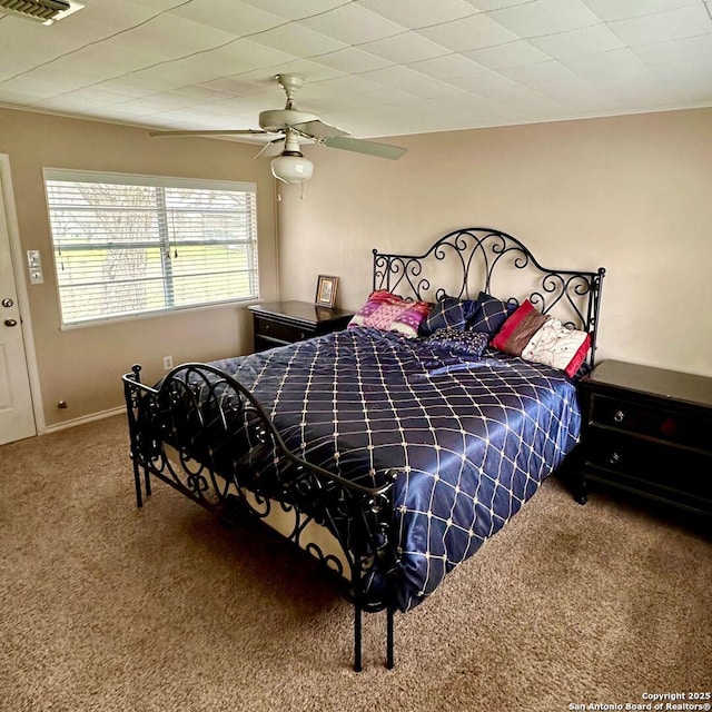 bedroom with carpet floors and ceiling fan