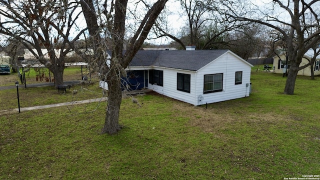 exterior space featuring a lawn