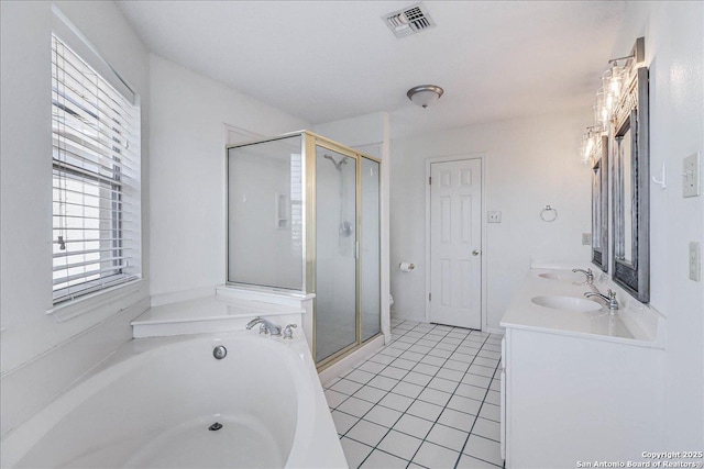 full bathroom featuring tile patterned flooring, vanity, plus walk in shower, and toilet