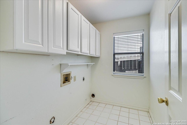 laundry room featuring cabinets, hookup for a washing machine, and electric dryer hookup