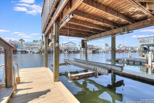 dock area featuring a water view