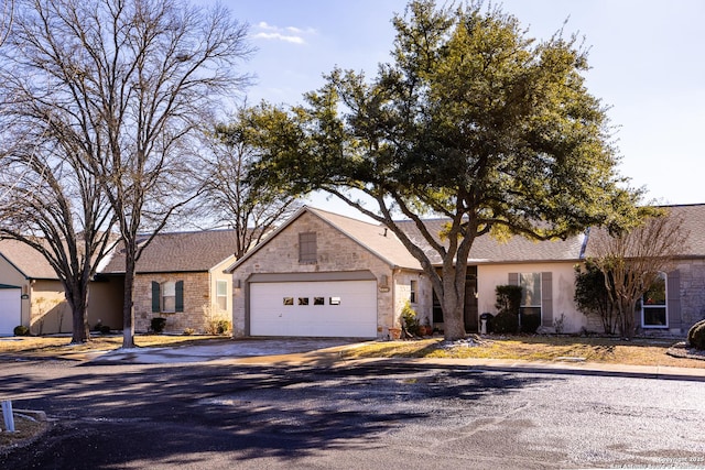 ranch-style home with a garage