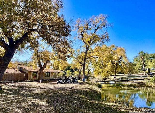 view of property's community with a water view