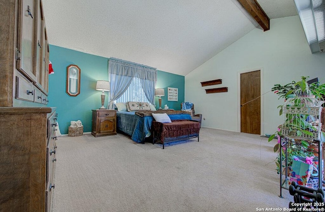 bedroom with lofted ceiling with beams, light carpet, and a textured ceiling