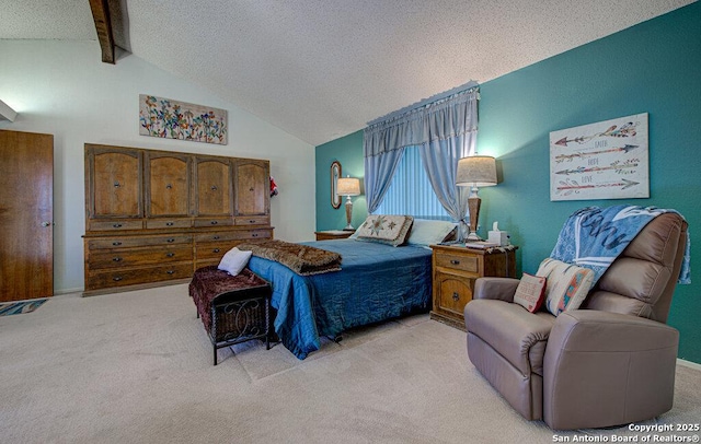 bedroom featuring lofted ceiling with beams, light carpet, and a textured ceiling