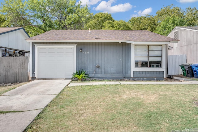 garage featuring a yard