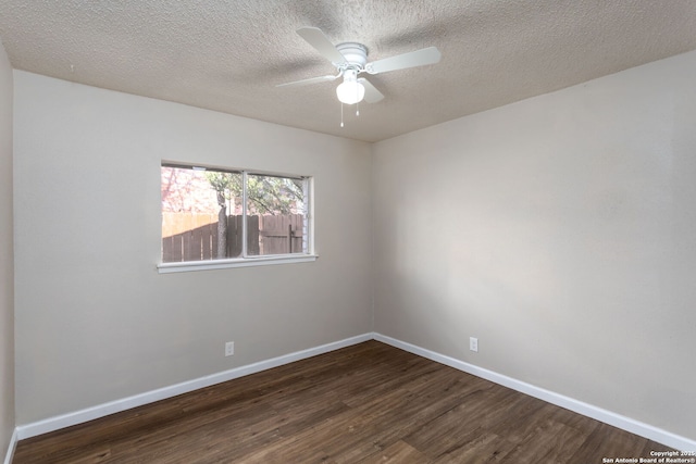 unfurnished room with ceiling fan, a textured ceiling, and dark hardwood / wood-style flooring