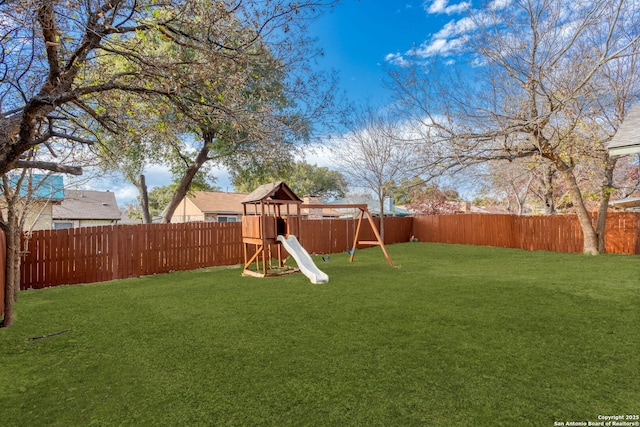 view of yard with a playground