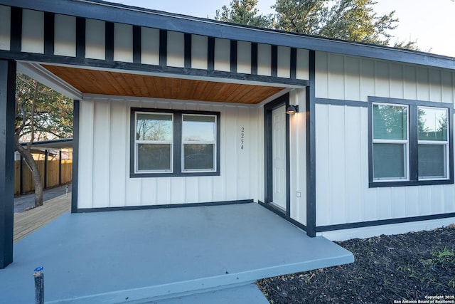 property entrance with a patio