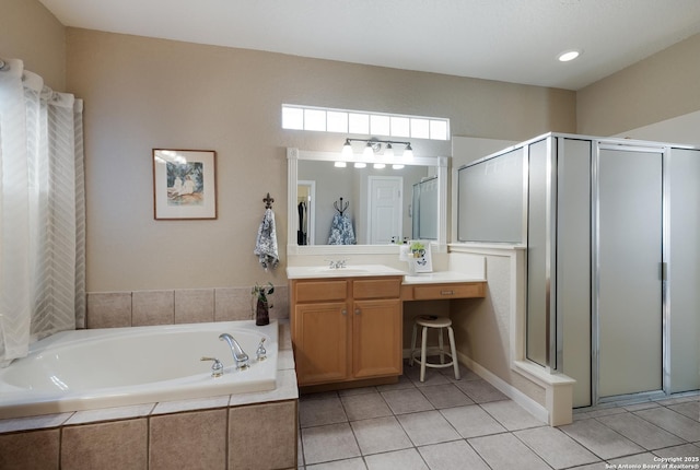 bathroom featuring vanity, separate shower and tub, and tile patterned flooring