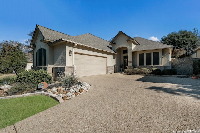 view of front of property with a garage