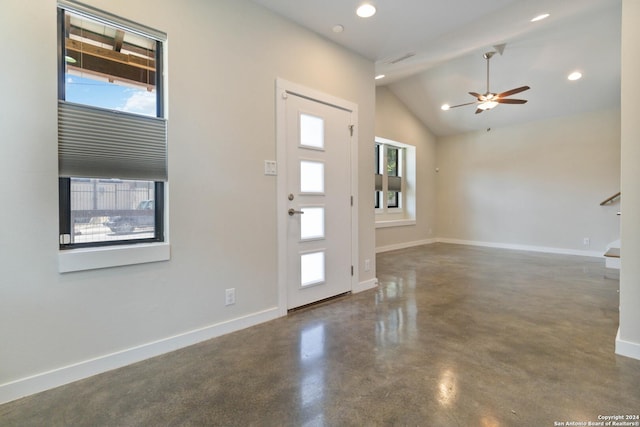 entryway with plenty of natural light, high vaulted ceiling, and ceiling fan