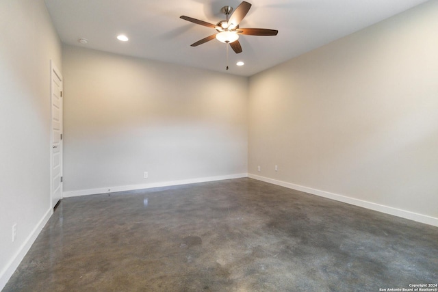 spare room with ceiling fan